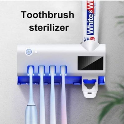 TOOTHBRUSH HOLDER WITH STERILIZER AND PASTE DISPENSER