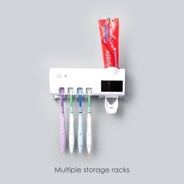 TOOTHBRUSH HOLDER WITH STERILIZER AND PASTE DISPENSER